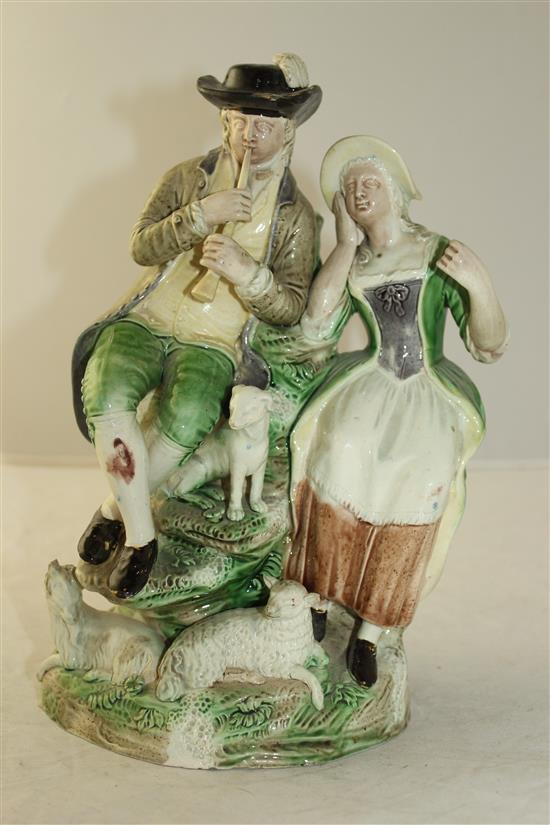 A Ralph Wood (the younger) lead-glazed group of a shepherd and shepherdess, c.1780-1800, 24.7cm, part of horn replaced and other slight